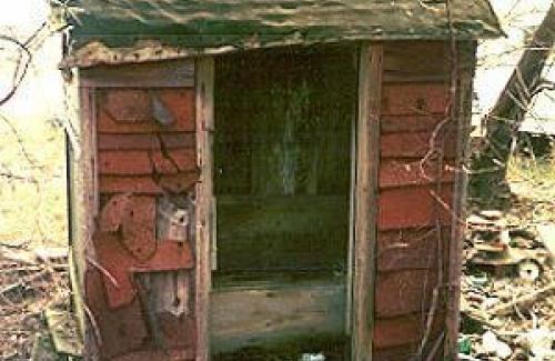Old red historical outhouse