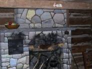 Hearth in log cabin