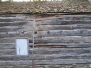old log cabin, side view with window